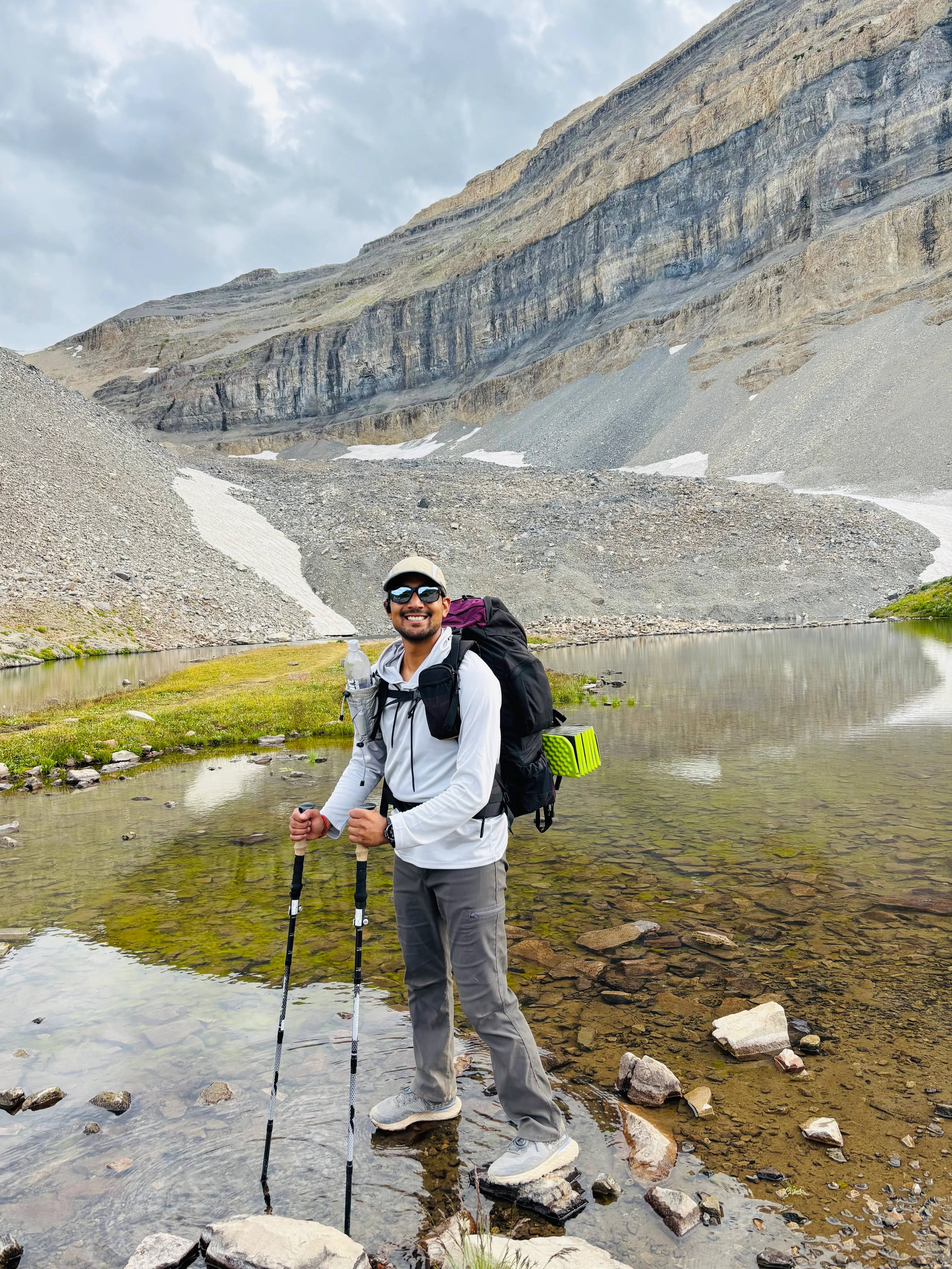 Saurav at a glacial lake on an overnight backpacking trip at Mt Timpanogos