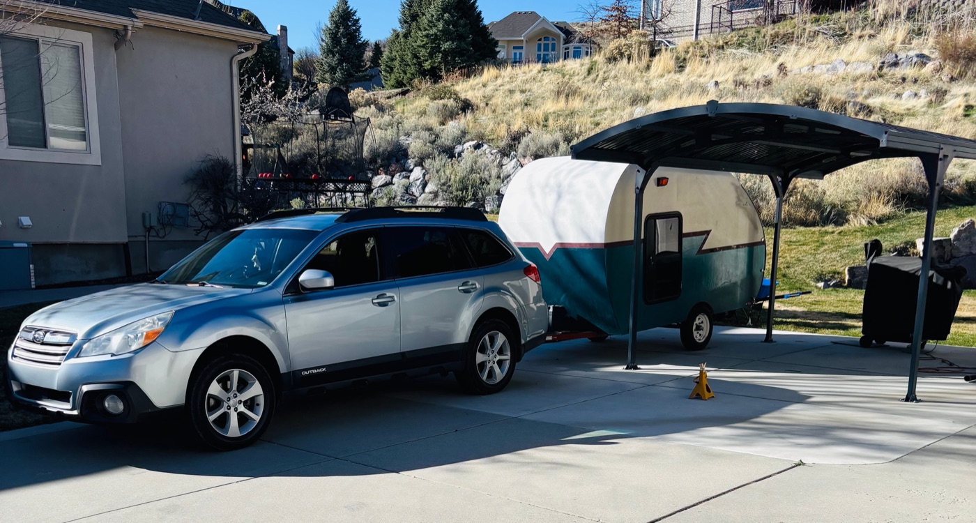 Pearl teardrop hitched to a 2013 Subaru Outback — first time hooked up