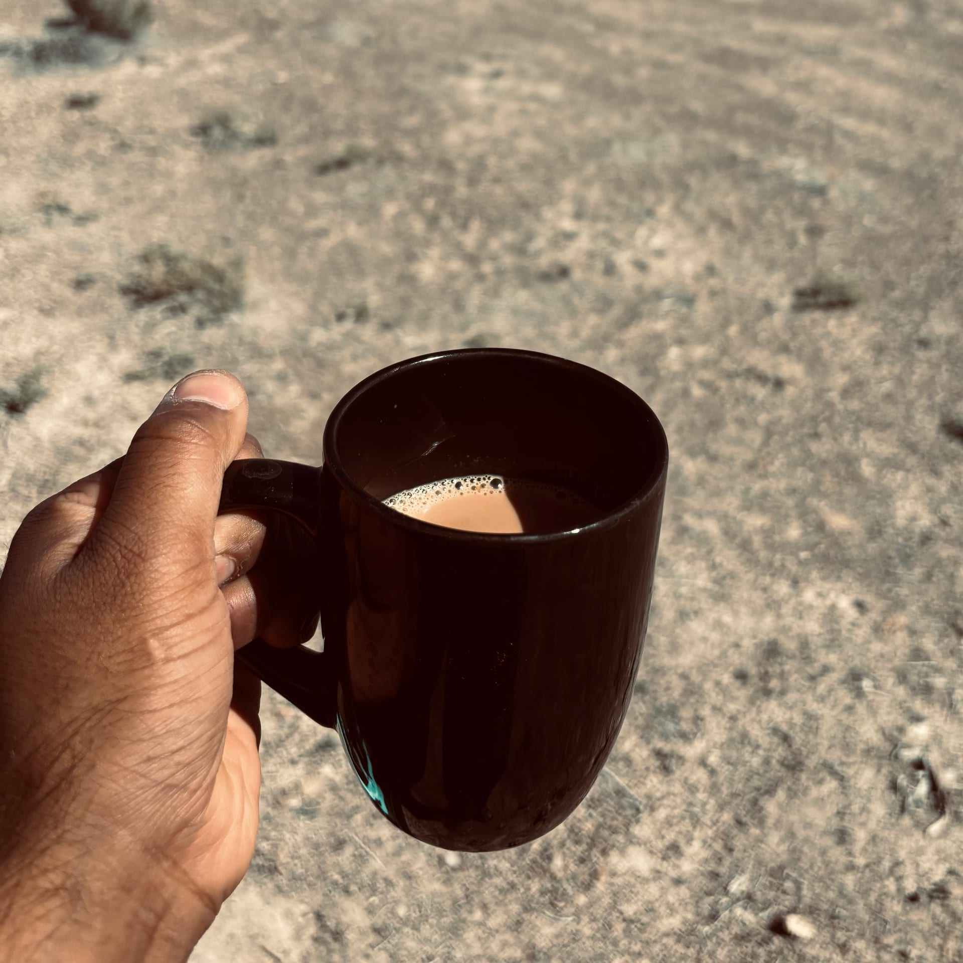 Morning chai with desert mountains in the background