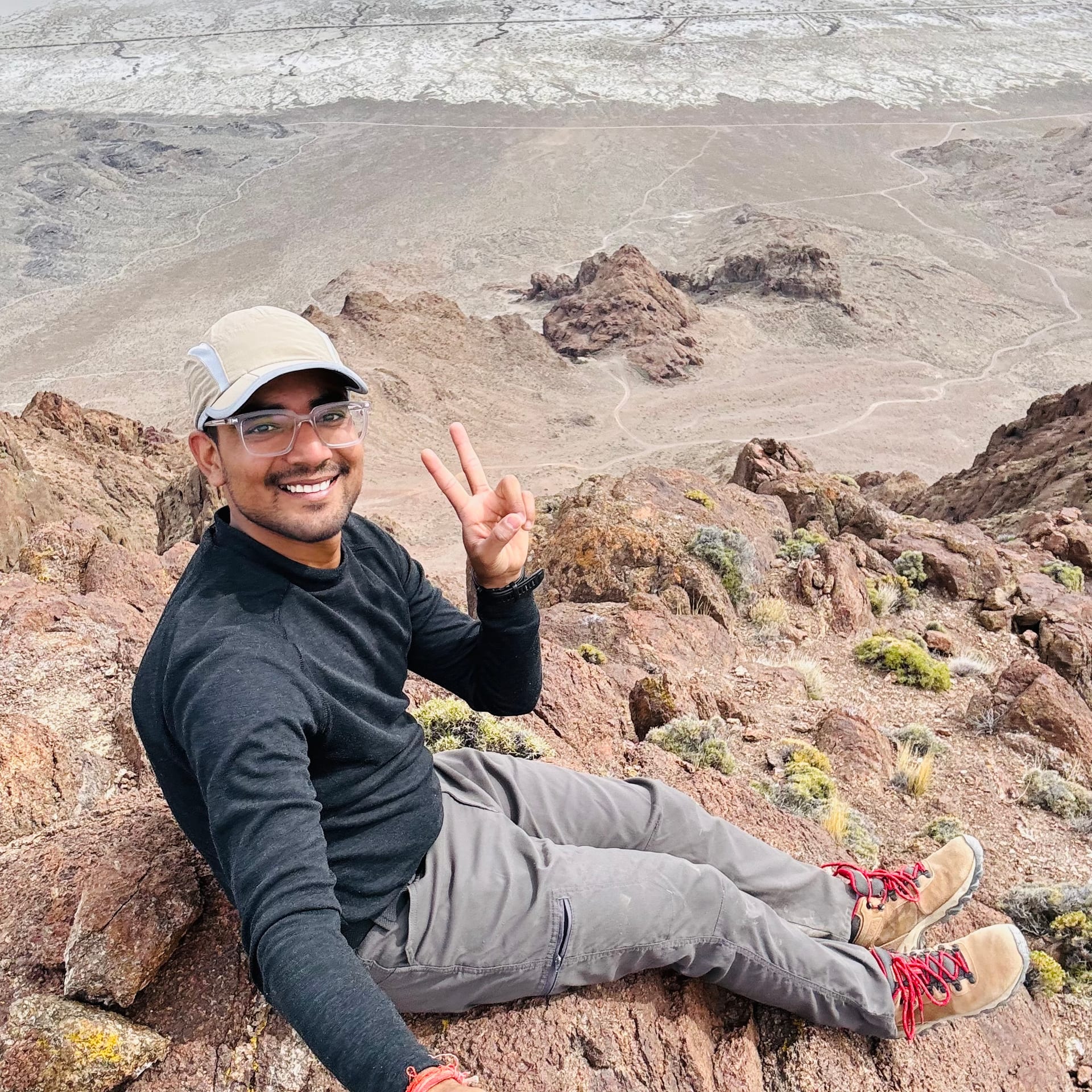 At the summit of Volcano Peak with the salt flats below